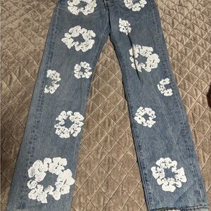 Stylish Blue Jeans with White Floral Design